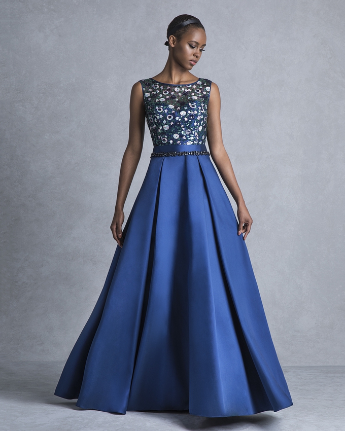 Long evening dress with beaded top and pleated skirt