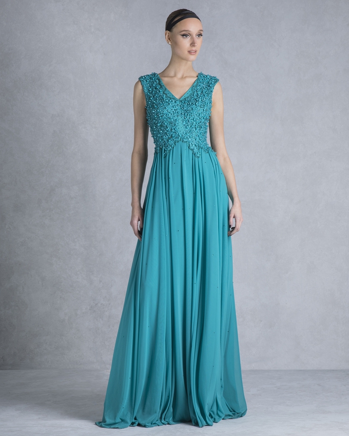 Long evening dress with fully beaded top