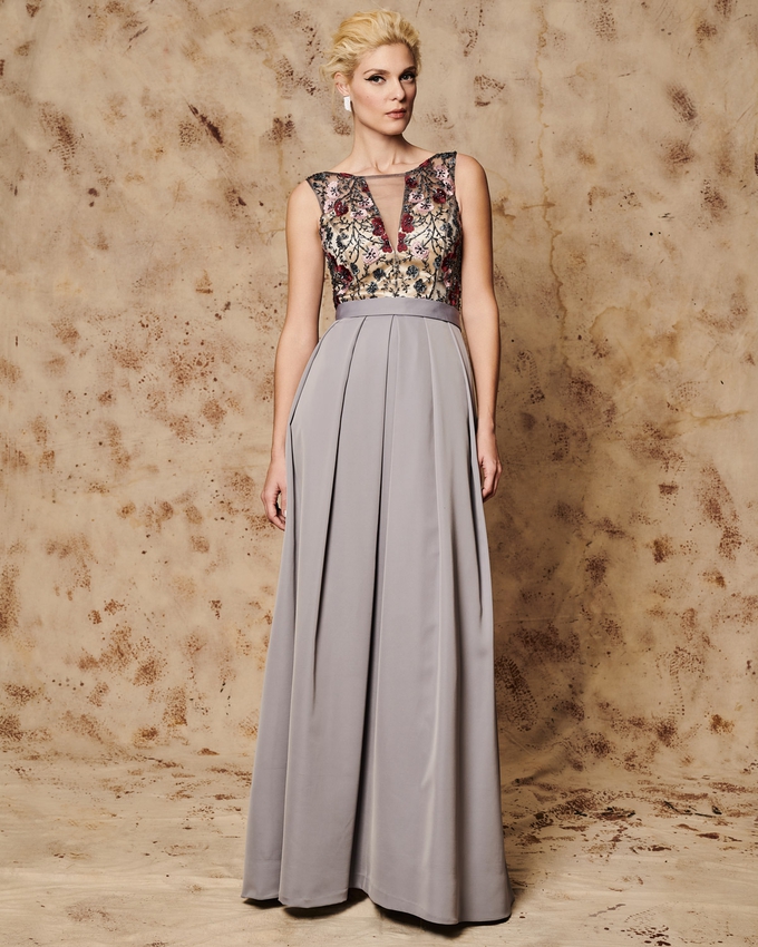 Long evening dress with applique flowers and beading