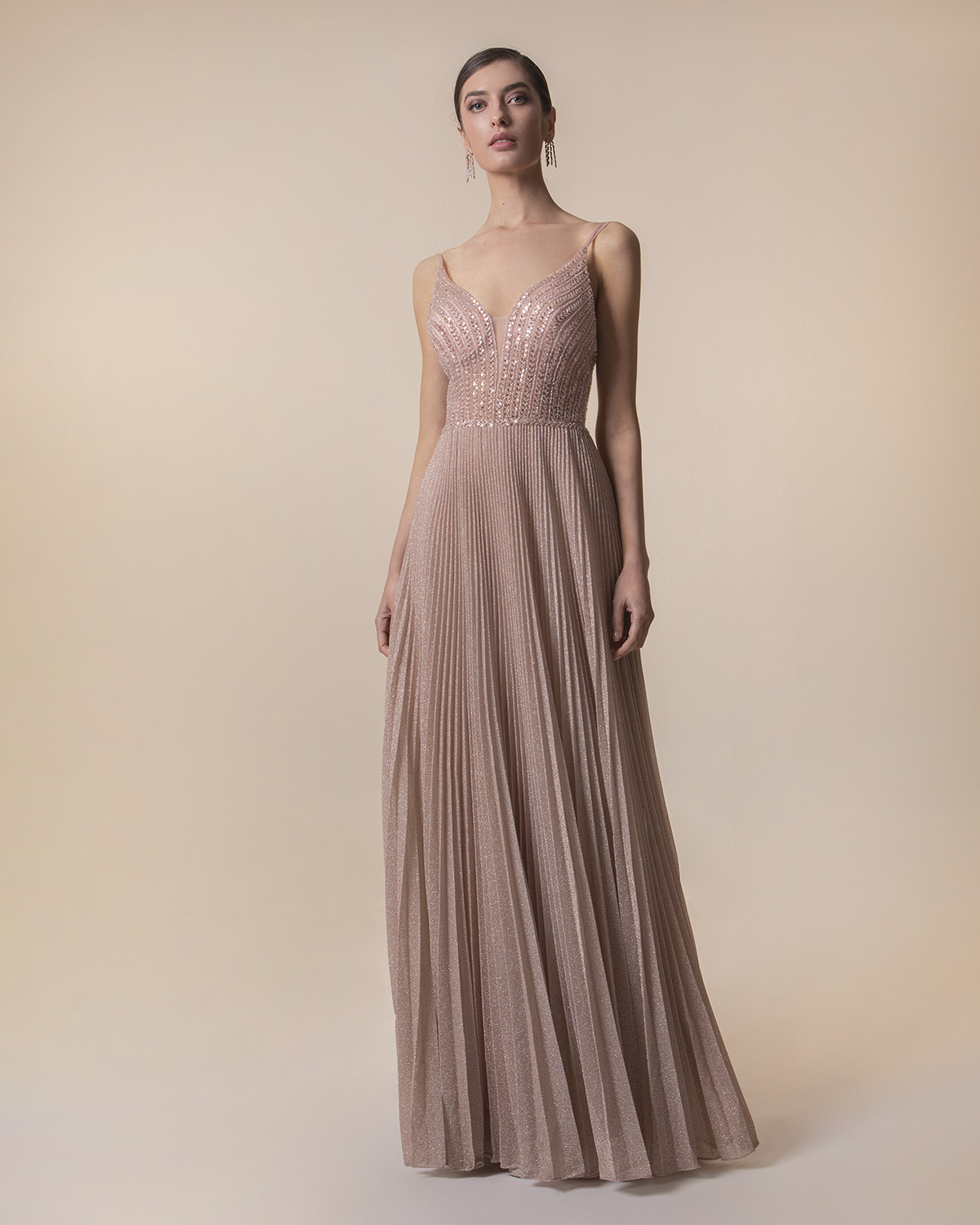 Evening Dresses / Long pleated evening dress with shining fabric and fully beaded top
