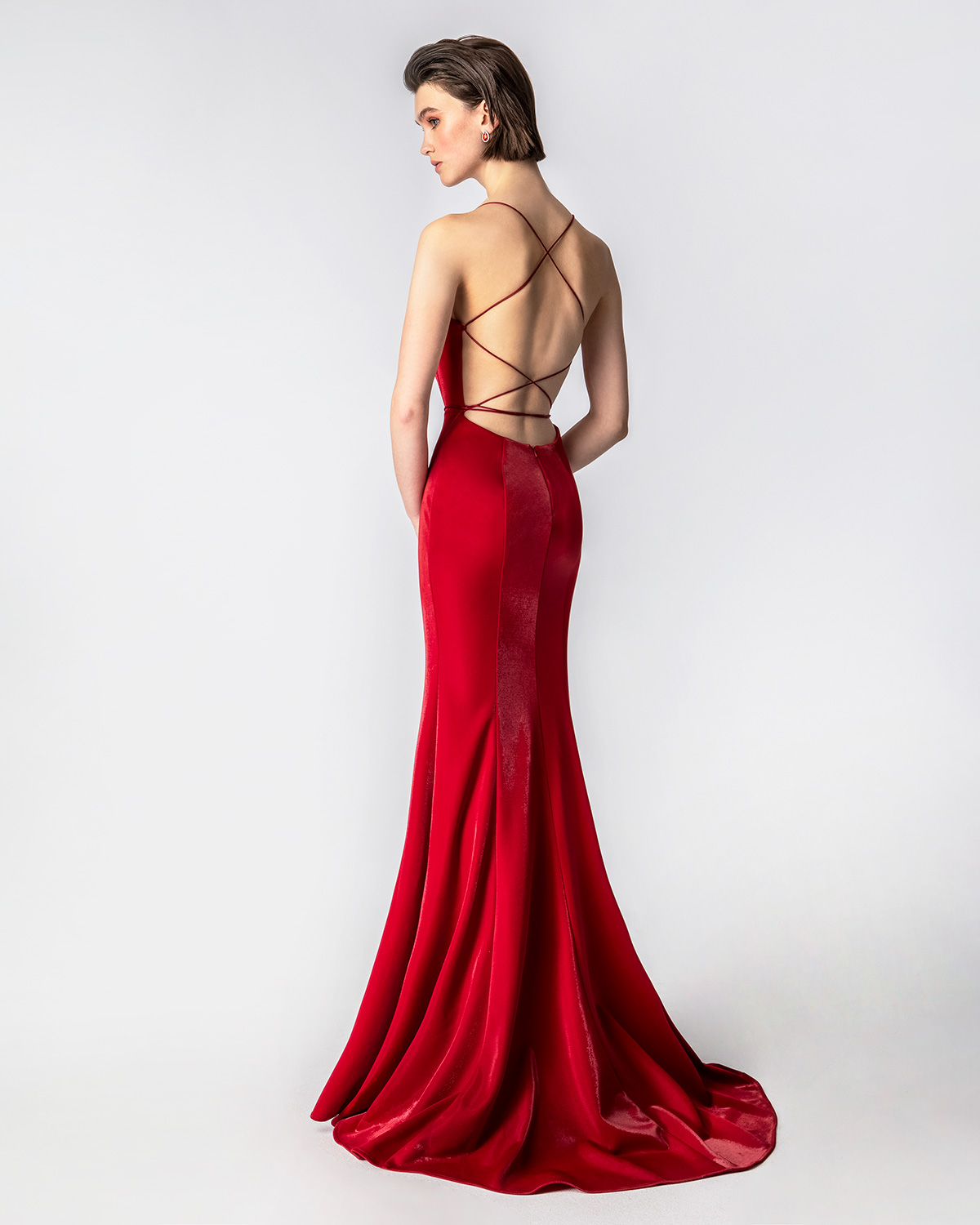 Cocktail Dresses / Long evening dress with shining fabric and open back