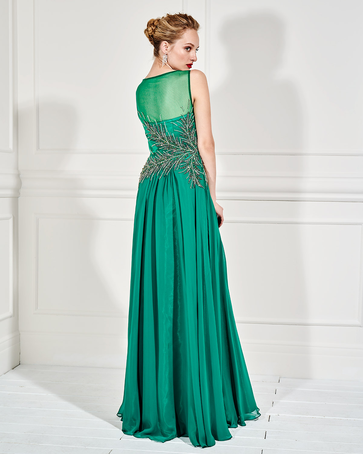 Evening Dresses / Long evening dress with beaded bust and transparency on the back