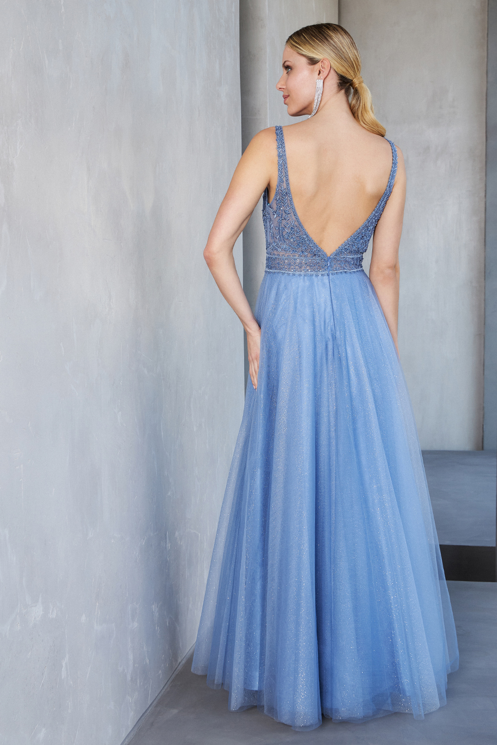 Evening Dresses / Long evening dress with shining tulle fabric and fully beaded top