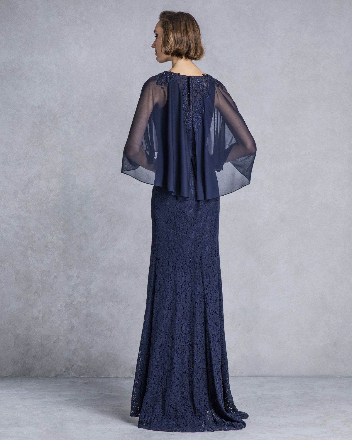 Classic Dresses / Long evening dress with lace skirt and cape