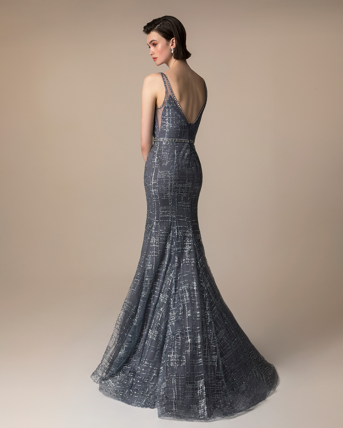 Evening Dresses / Long evening beaded dress with beading on the waist
