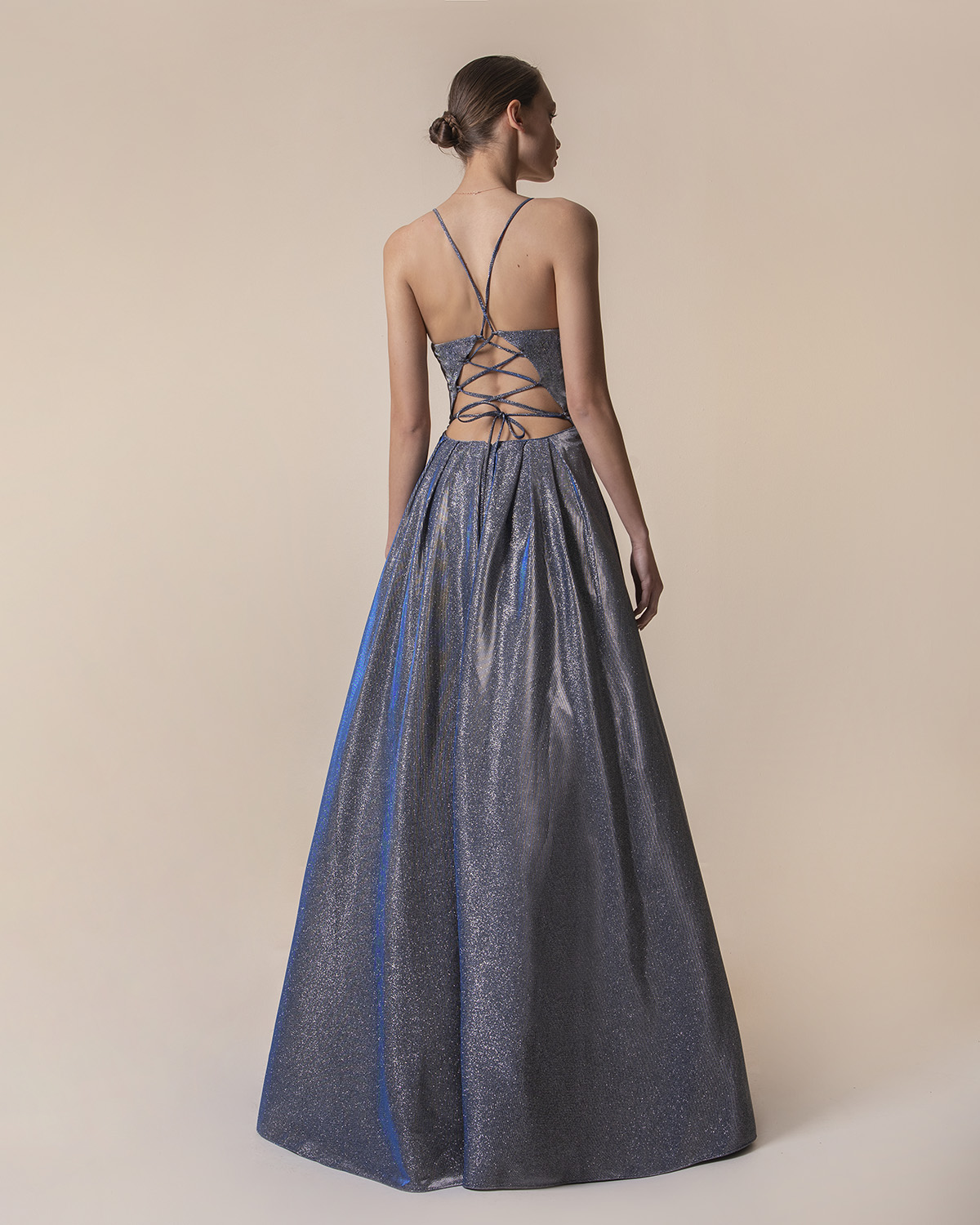 Evening Dresses / Long evening dress with shining fabric and open back