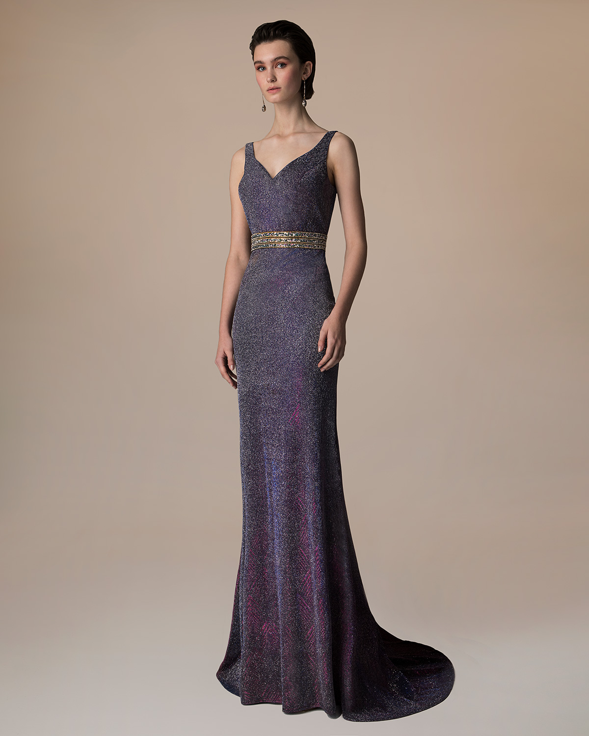 Evening Dresses / Long evening beaded dress with shining fabric and beaded waist