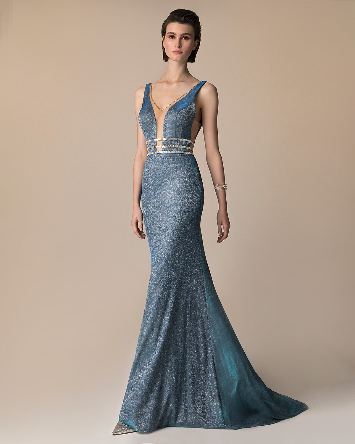 Evening Dresses / Long evening  dress with shining fabric,  beaded waist and open back