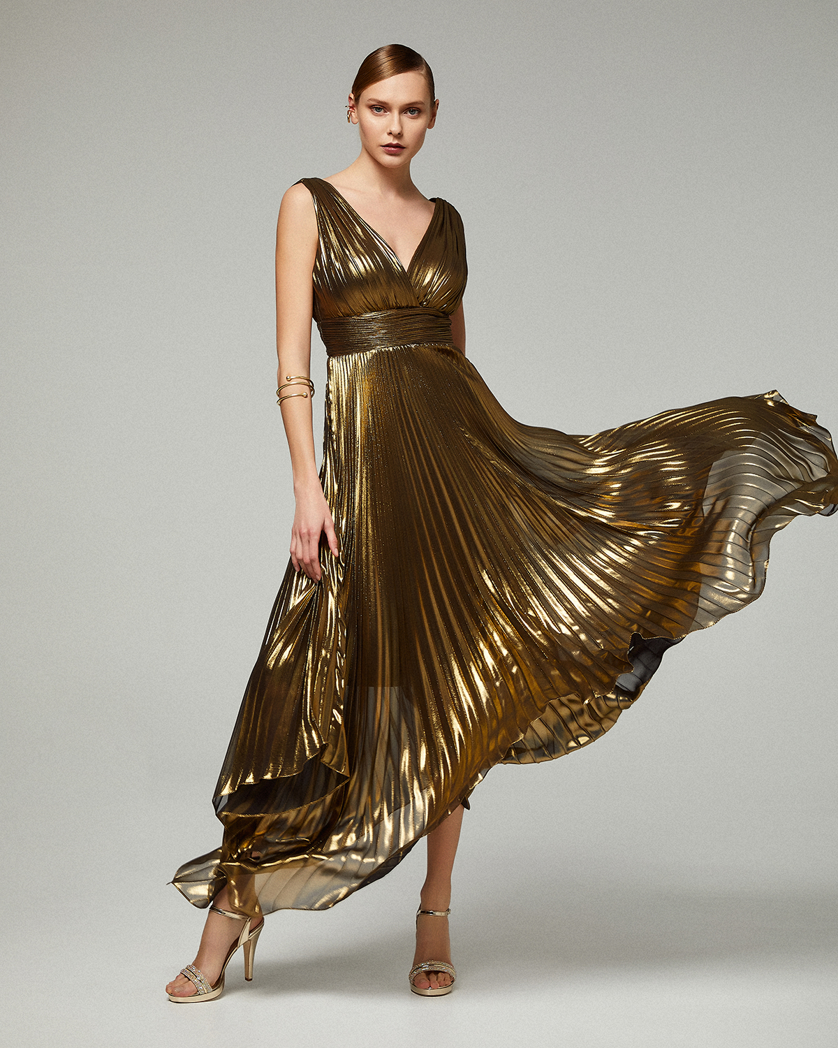 Evening Dresses / Evening asymmetrical pleated dress with shining fabric