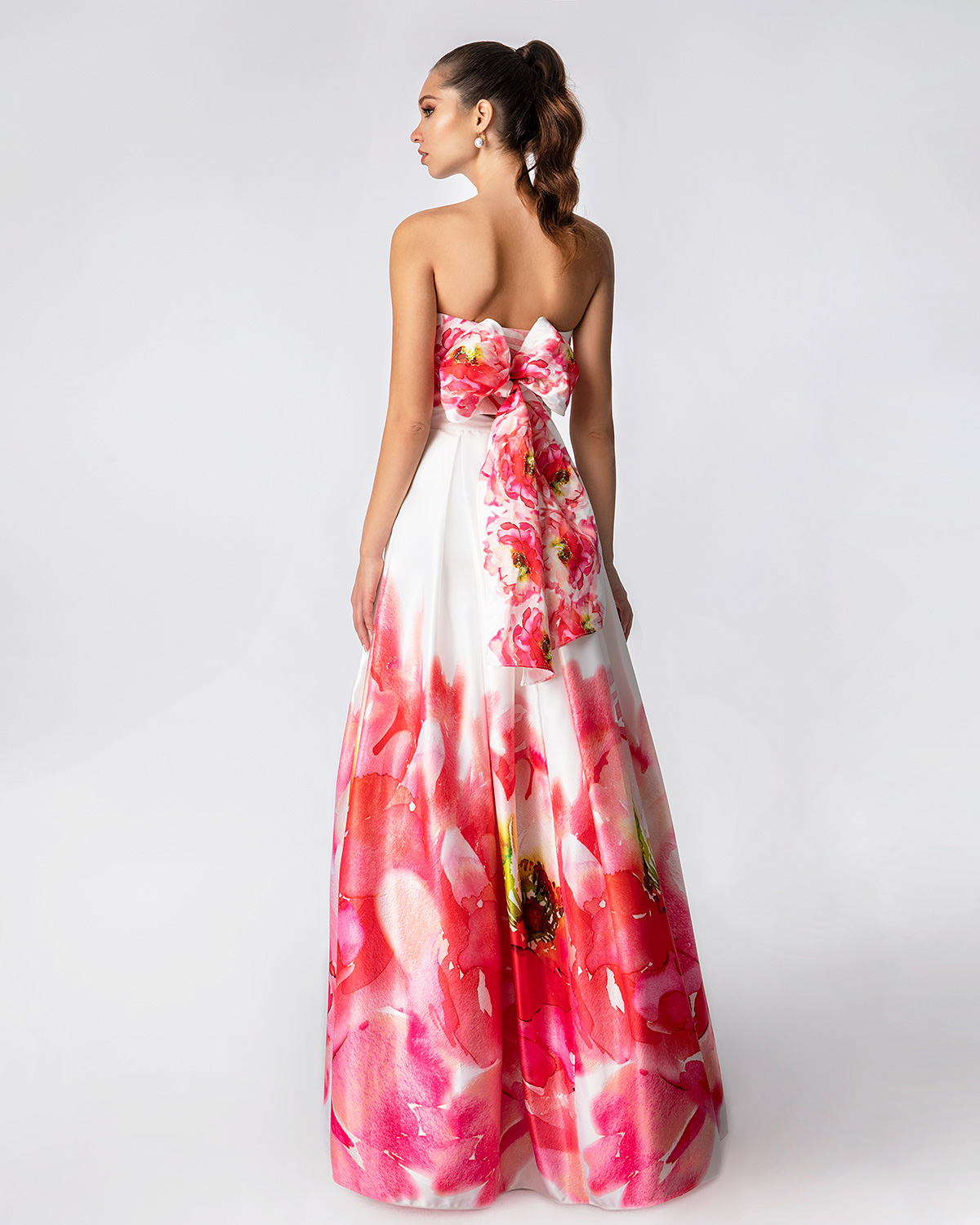 Cocktail Dresses / Long printed skirt and top with a big bow on the back