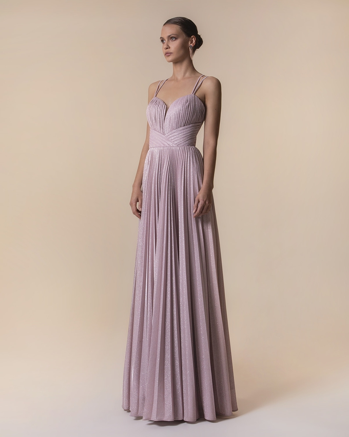 Long pleated evening dress with shining fabric