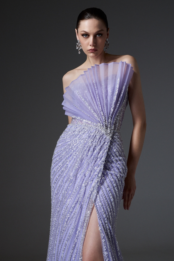 Evening long strapless fully embroidered dress with a slit
