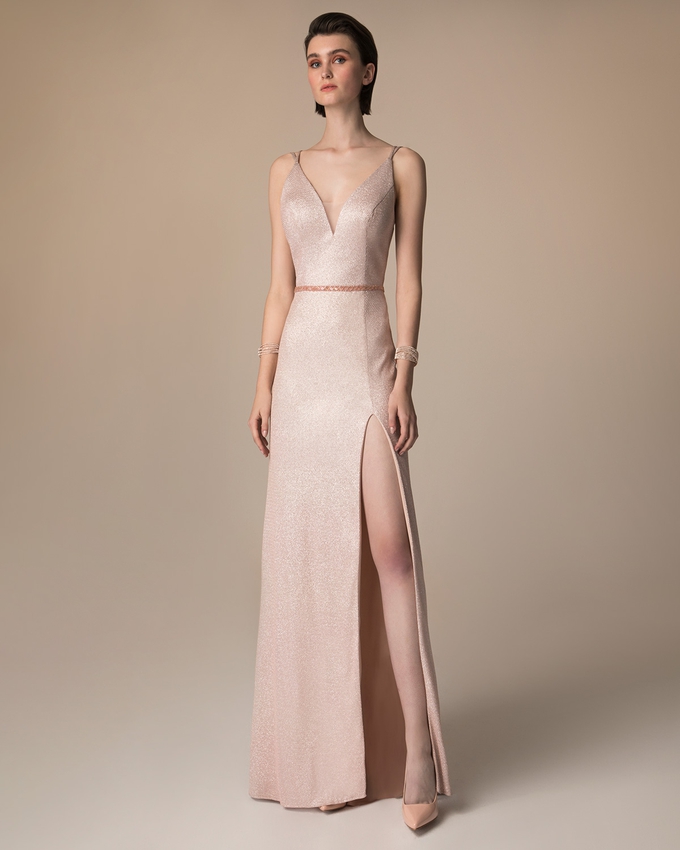 Long evening dress with beaded belt and shining fabric