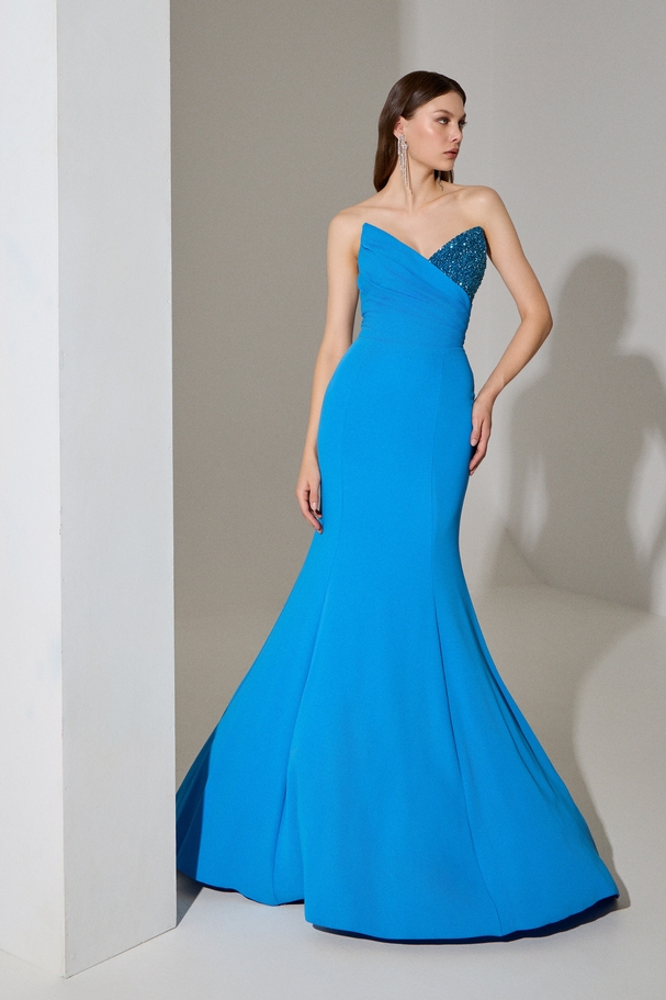 Evening long strapless crepe dress with fully embroidered bodice