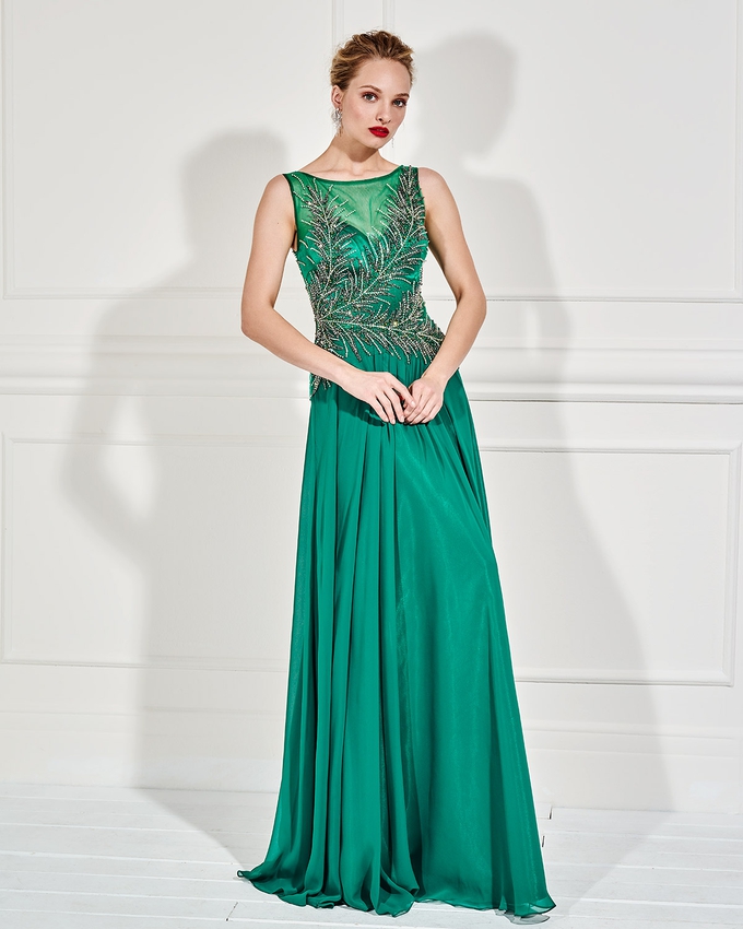 Long evening dress with beaded bust and transparency on the back