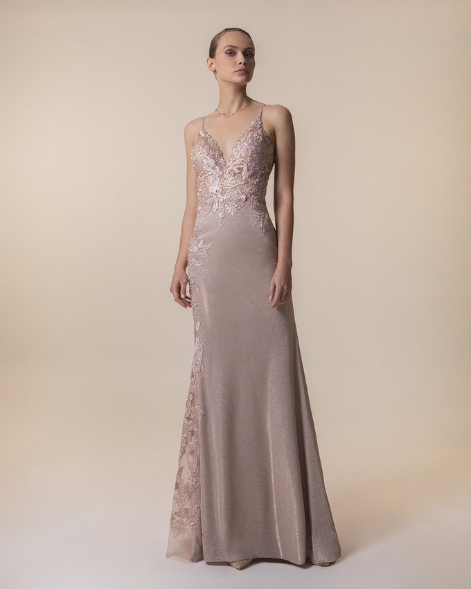 Long evening dress with shining fabric, applique beaded lace on the top