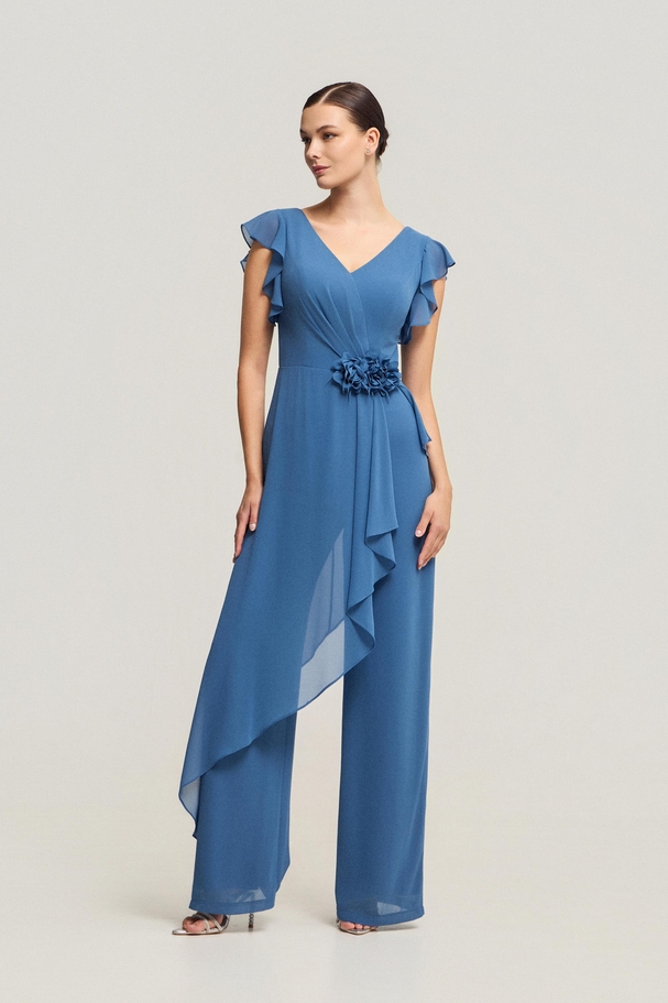 Classic jumpsuit with ruffles, waist flower and elegant flowing silhouette