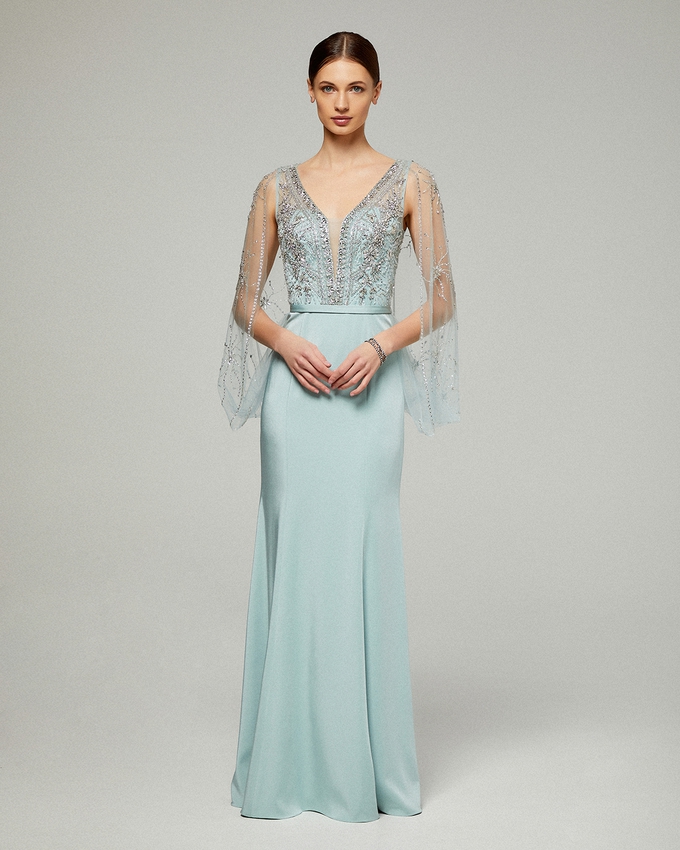 Long evening fully beaded dress with beaded cape