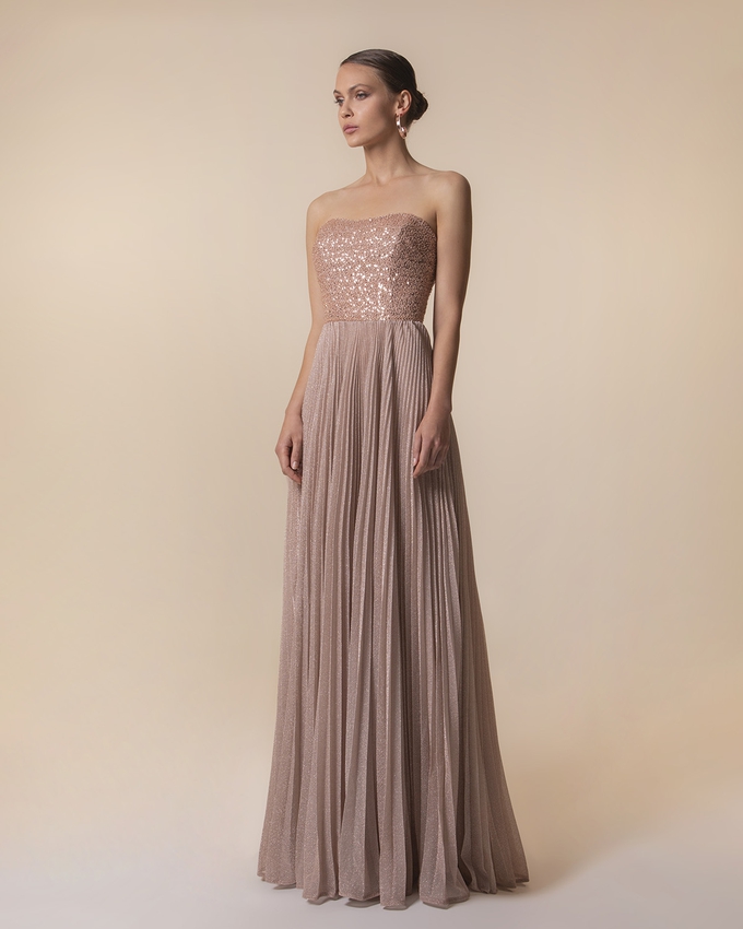 Long strapless evening dress with fully beaded top