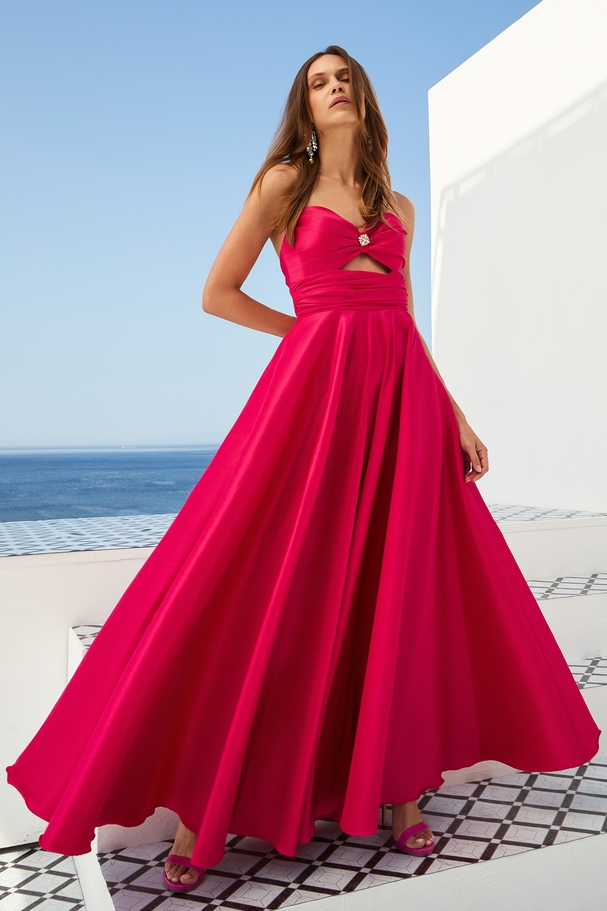 Strapless youthful cocktail dress with distinctive bodice, full skirt, ideal for graduation.