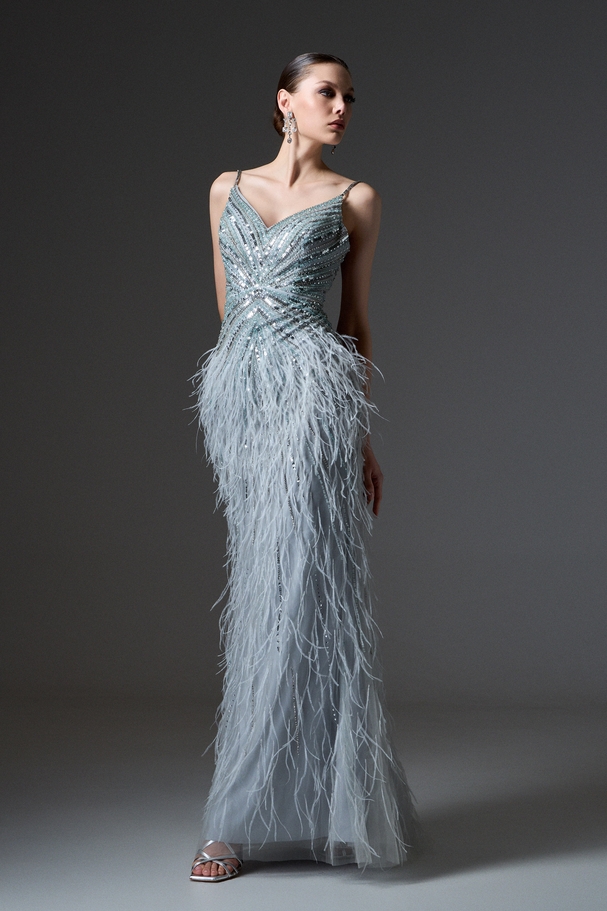 Evening long fully embroidered dress with feathers