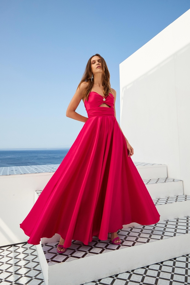 Strapless youthful cocktail dress with distinctive bodice, full skirt, ideal for graduation.