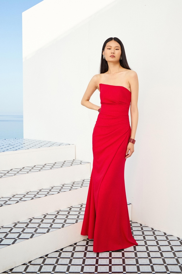 Strapless graduation cocktail dress, fitted with front slit.