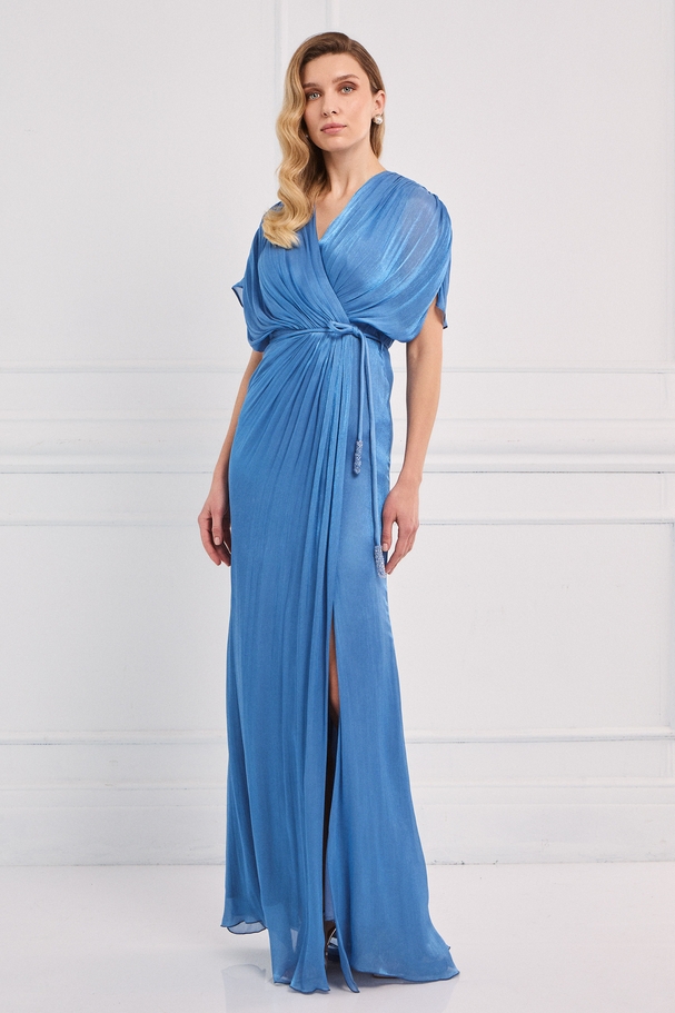 Classic long dress made of shiny fabric with sleeves and a belt at the waist