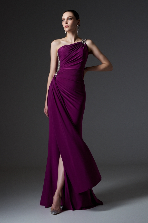 Evening long one-shoulder dress with embroidery on the shoulder and side