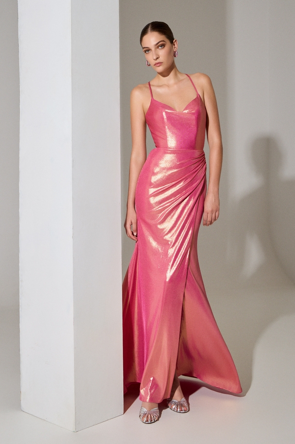 Eveningl long backless dress made of shiny fabric