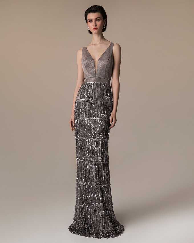 Long evening dress with fringed and top with shining fabric