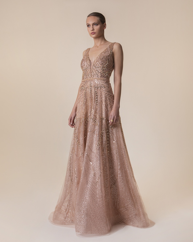 Long fully beaded evening dress with tulle fabric