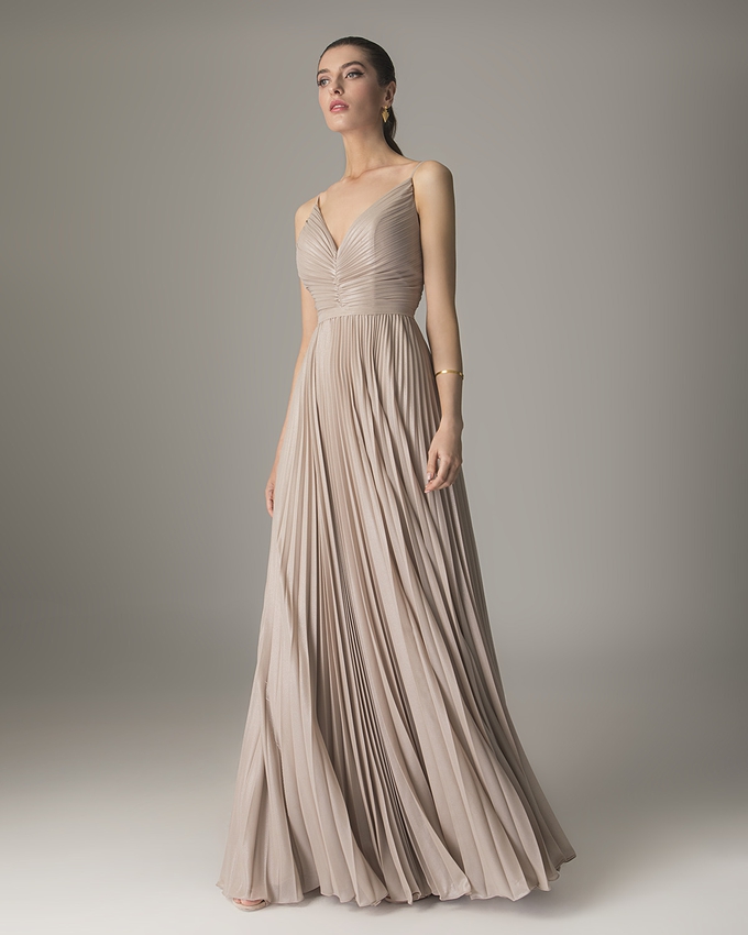 Long pleated dress with shining fabric
