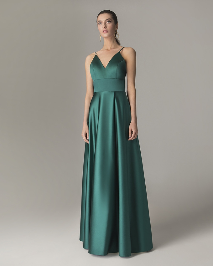 A long satin cocktail dress with open back
