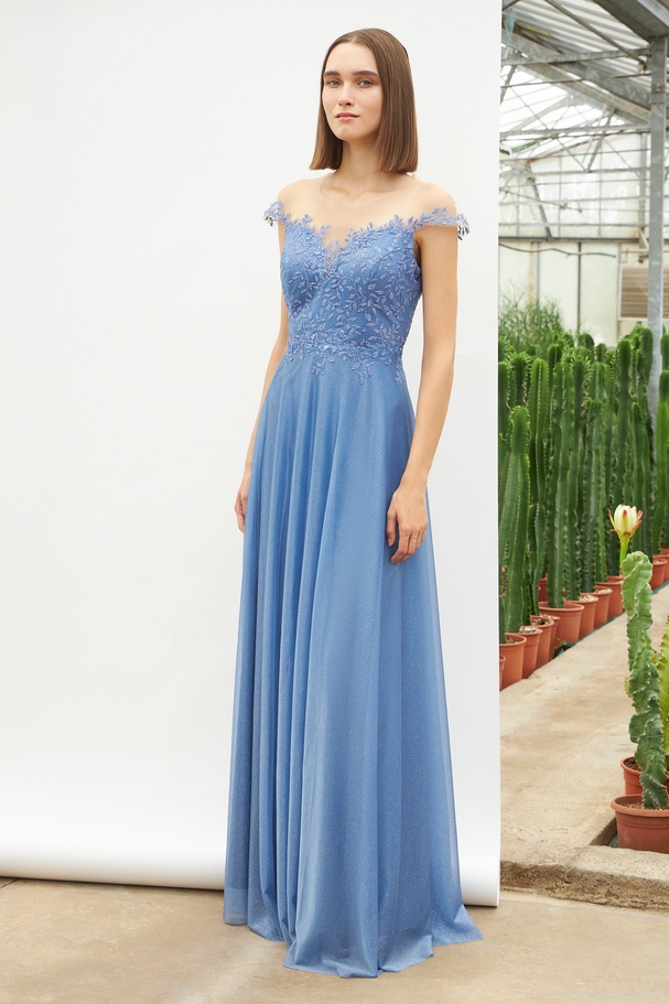 Long classic dress with shining fabric and beaded top
