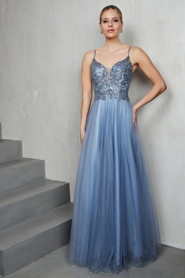 Long evening dress with shining tulle fabric and fully beaded top