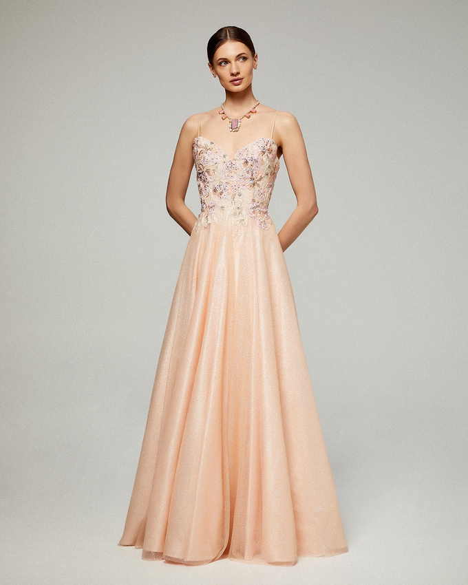 Long evening shining dress with lace beaded top