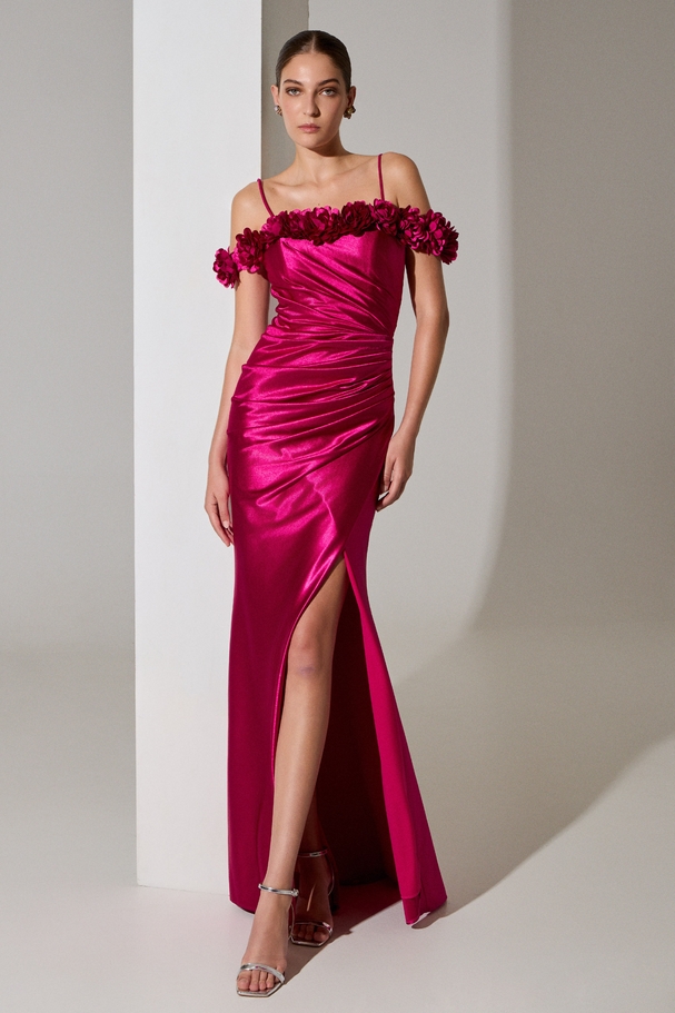 Evening long satin mermaid dress with flowers around the top and a slit