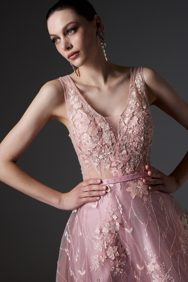 Evening long tulle dress embroidered with feathers and butterflies
