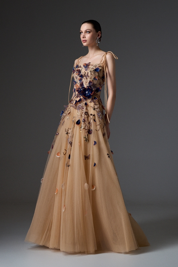 Evening long tulle dress embroidered with feathers and butterflies