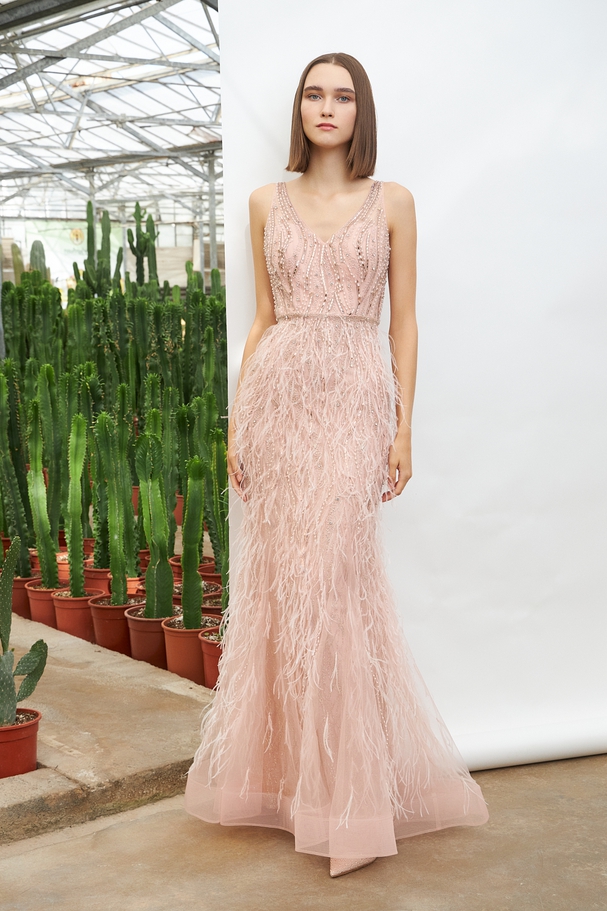 Long evening fully beaded dress with feathers