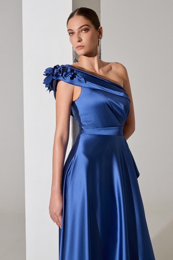 Eveningl long satin dress with one shoulder, asymmetry on the side, and ruffle