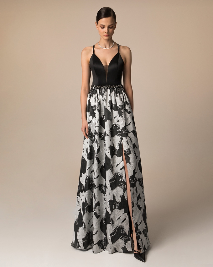 Long evening printed brocade dress with solid color top and beaded belt