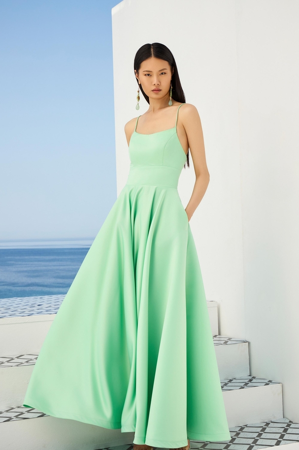 Stunning satin cocktail dress with open back and full skirt.