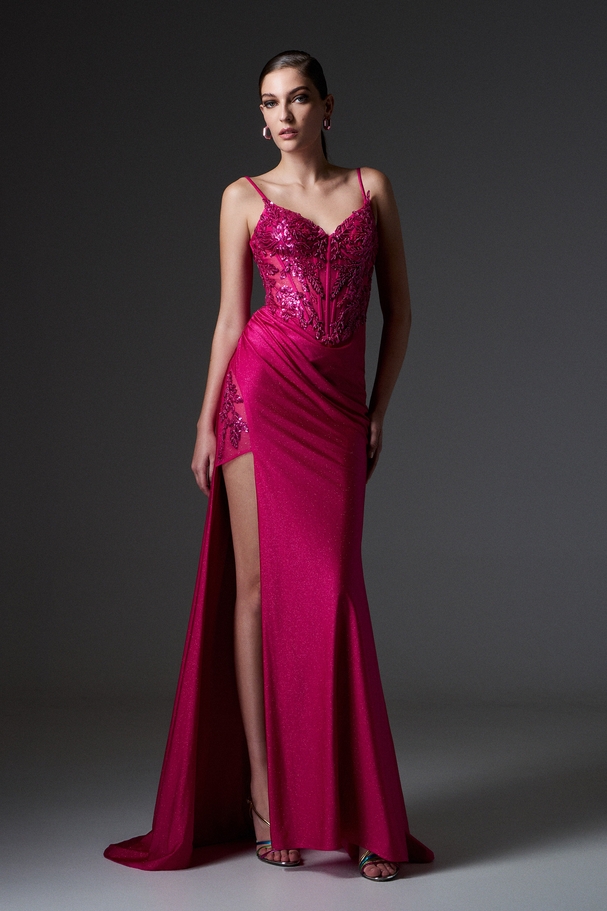 Evening long dress made of stretch shiny satin fabric with fully embroidered boned top