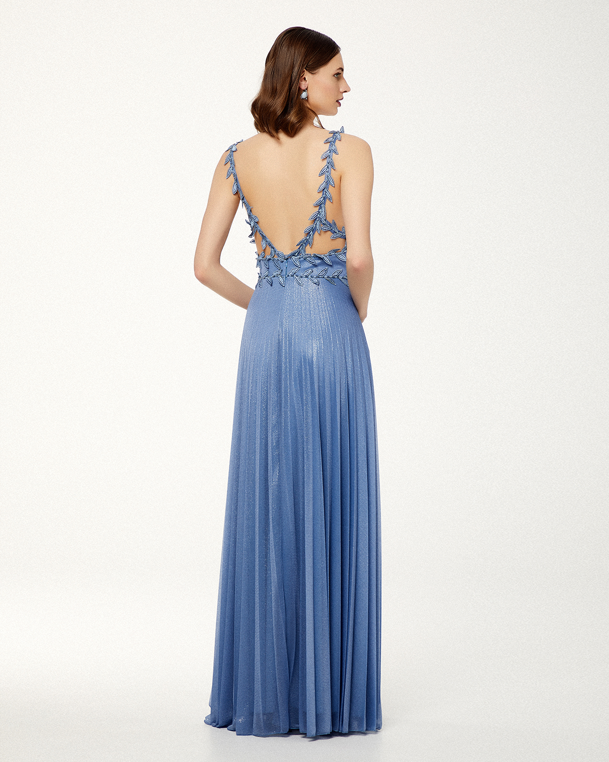 Long cocktail dress with shining fabric and straps