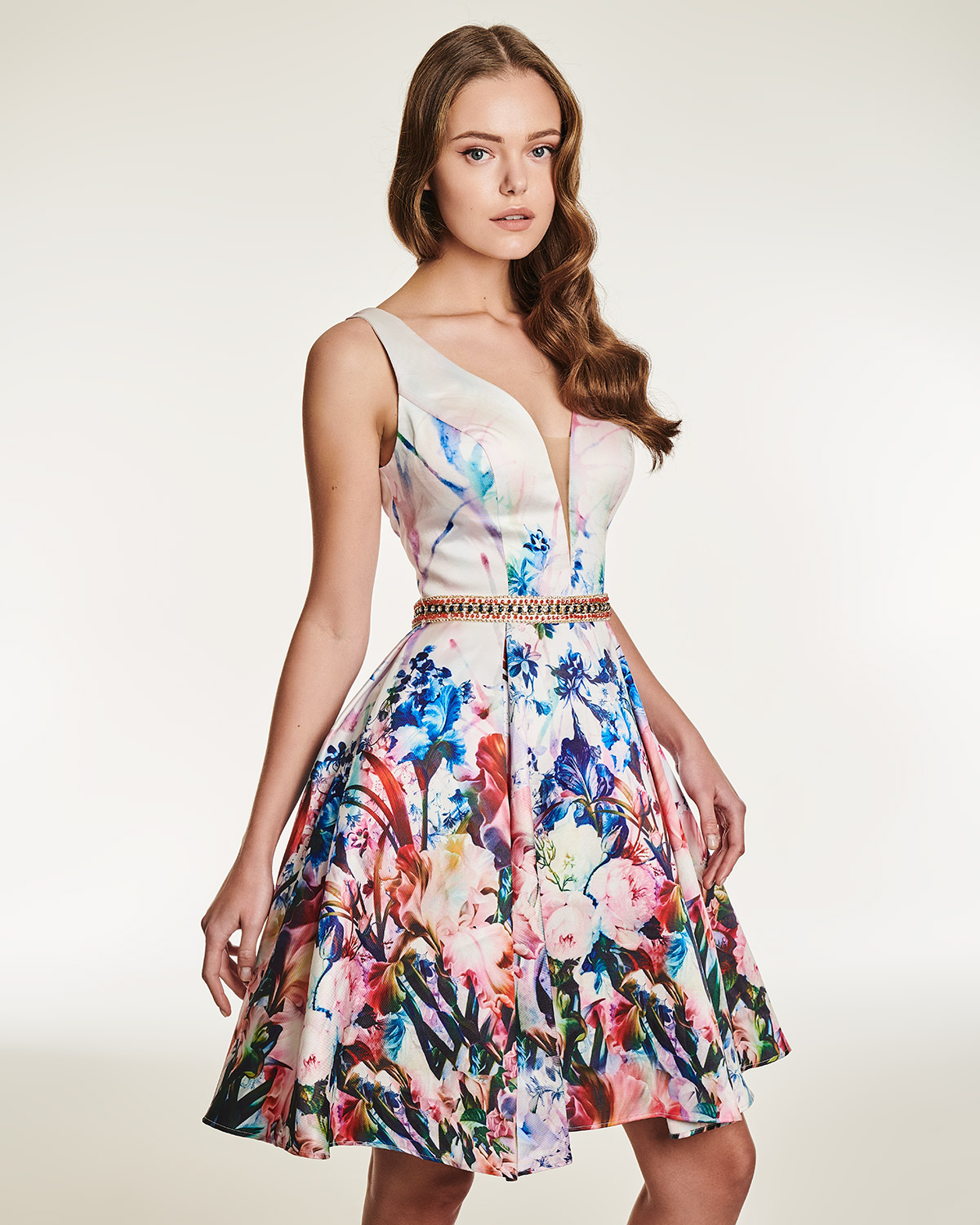 Cocktail dress with floral motif and beading on the waistbund