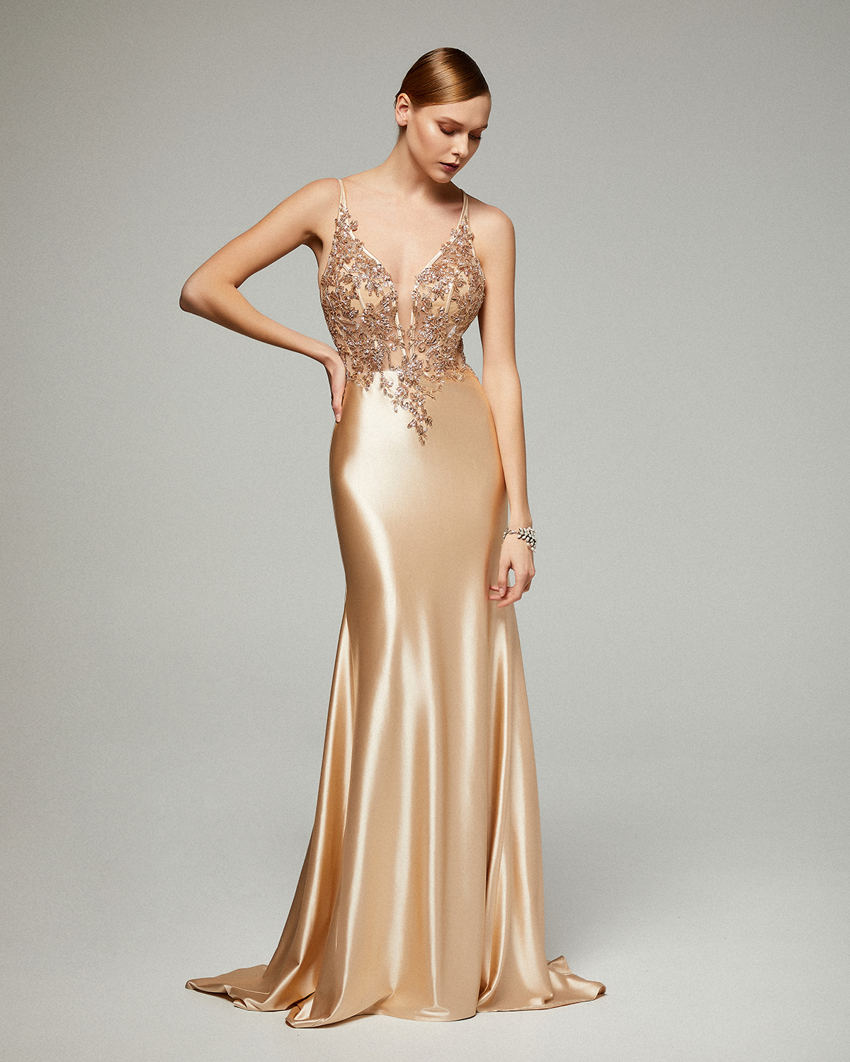 Long evening satin dress with beaded top and open back