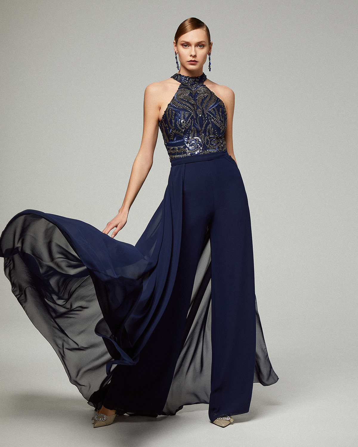 Evening jumpsuit with beaded top and chiffon skirt