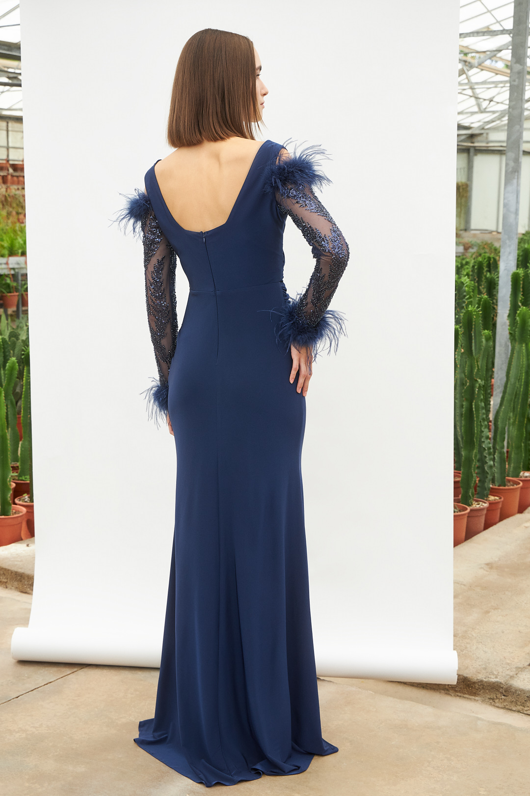 Classic Dresses / Long classic dress with long beaded sleeves and feathers on the sleeves
